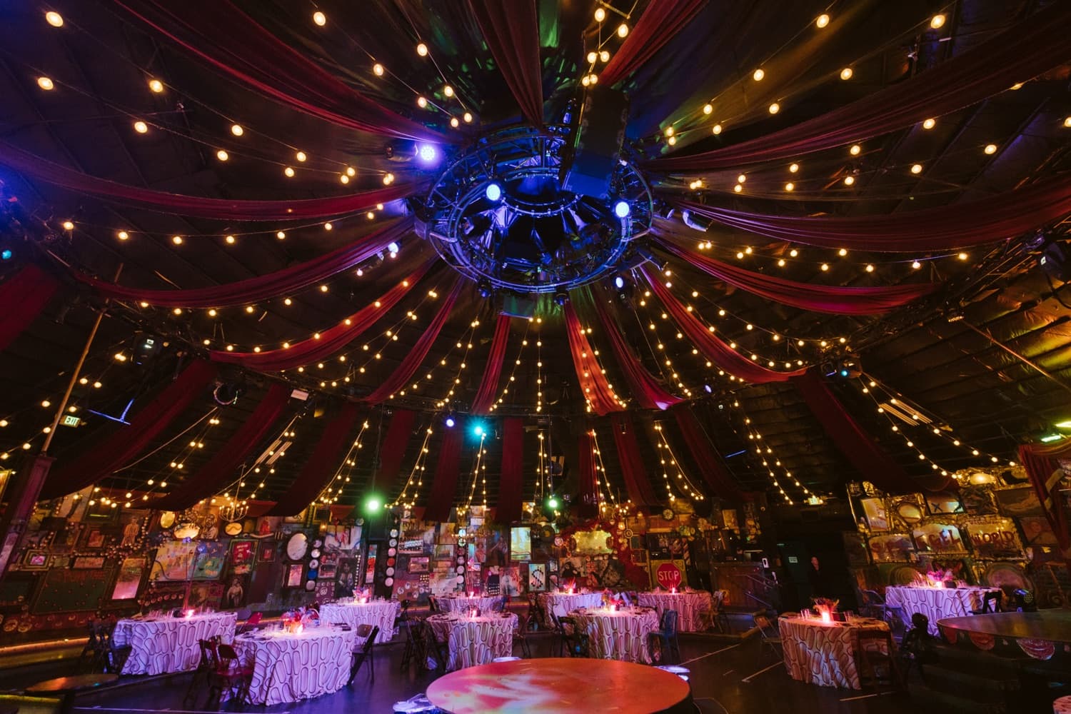 A dramatically lit tented gala